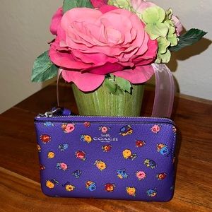 Coach Purple Floral Leather Corner Zip Wristlet NWT